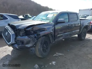 2022 Toyota Tacoma 4WD SR with VIN 3TYCZ5AN0NT056524, listed as a IAAI auction lot 41454556 with 49,871 mi miles. Bid and sale history available at carsss.com. Image 21.