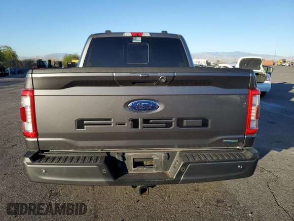 2022 Ford F-150 XL with VIN 1FTFW1E89NFA14920, listed as a Copart auction lot 76790934 with 64,991 mi miles and Salvage Title. Bid and sale history available at DreamBid. Image 6.