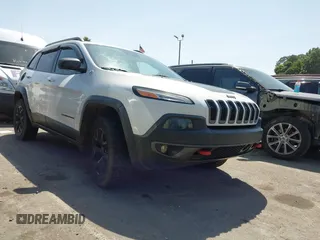 2015 Jeep Cherokee Trailhawk with VIN 1C4PJMBS5FW654399, listed as a IAAI auction lot 42550114 with 205,542 mi miles and . Bid and sale history available at DreamBid. Image 1.