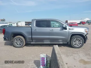 2021 GMC Sierra 1500 Denali z VIN 3GTU9FETXMG382438, wystawiony jako IAAI lot #41880365 z przebiegiem 54 651 mil mil oraz . Historia ofert i sprzedaży dostępna na DreamBid. Obrazek 14.