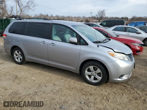 2012 Toyota Sienna LE AAS with VIN 5TDKK3DC7CS211660, listed as a Copart auction lot 46669825 with 187,318 mi miles and Salvage Title. Bid and sale history available at carsss.com. Image 4.