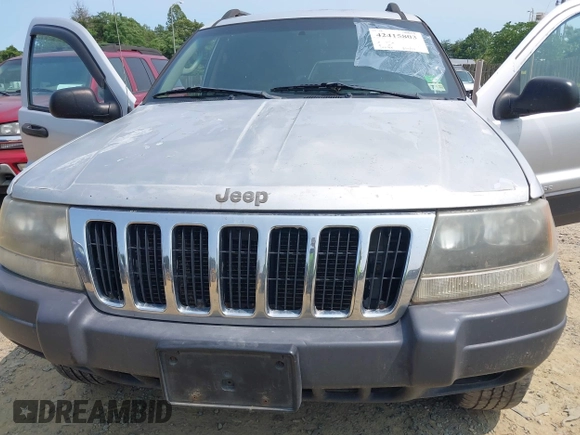 2003 Jeep Grand Cherokee Laredo with VIN 1J4GW48S83C558962, listed as a IAAI auction lot 42415803 with 312,419 mi miles and . Bid and sale history available at DreamBid. Image 6.