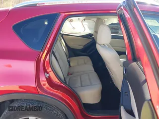2014 Mazda CX-5 Touring с VIN JM3KE2CY7E0341630, выставлен на аукционе IAAI как лот 40830171 с пробегом 117 430 миль миль и . История ставок и продаж доступна на DreamBid. Изображение 8.
