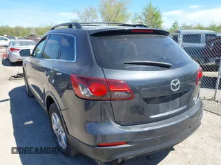 2015 Mazda CX-9 Touring z VIN JM3TB3CV3F0465162, wystawiony jako IAAI lot #42112814 z przebiegiem 108 623 mil mil oraz . Historia ofert i sprzedaży dostępna na DreamBid. Obrazek 3.