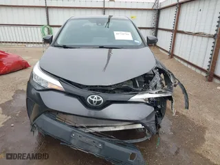 2020 Toyota C-HR LE with VIN JTNKHMBX0L1073916, listed as a IAAI auction lot 41720784 with 96,730 mi miles. Bid and sale history available at carsss.com. Image 12.