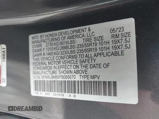 2023 Honda Odyssey Touring with VIN 5FNRL6H86PB065670, listed as a IAAI auction lot 41691093 with 22,518 mi miles and . Bid and sale history available at DreamBid. Image 9.