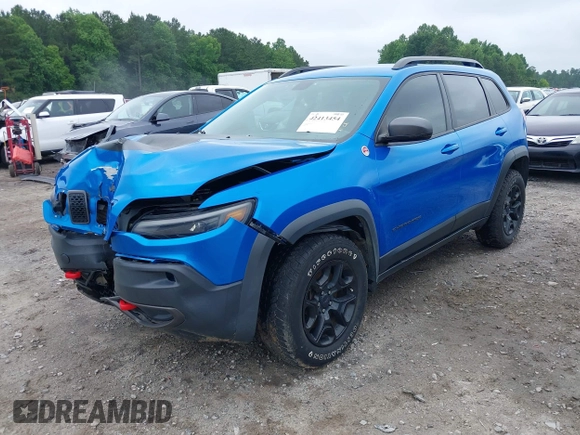 2019 Jeep Cherokee Trailhawk with VIN 1C4PJMBX0KD141577, listed as a IAAI auction lot 42413454 with 122,386 mi miles and . Bid and sale history available at DreamBid. Image 2.
