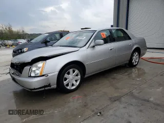 2006 Cadillac DTS 1SD z VIN 1G6KD57Y26U115094, wystawiony jako Copart lot #53534355 z przebiegiem 126 631 mil mil oraz Szkody całkowita. Historia ofert i sprzedaży dostępna na DreamBid. Obrazek 1.
