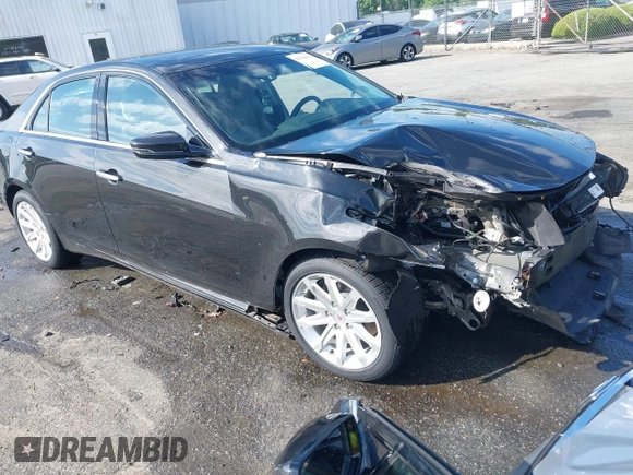 2014 Cadillac CTS RWD with VIN 1G6AP5SX9E0134183, listed as a IAAI auction lot 42190674 with 59,603 mi miles and . Bid and sale history available at DreamBid. Image 1.