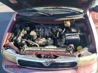1996 Mercury Villager GS z VIN 4M2DV11W3TDJ03500, wystawiony jako Copart lot #70410394 z przebiegiem 252 139 mil mil oraz Szkoda całkowita • Salvage title. Historia ofert i sprzedaży dostępna na DreamBid. Obrazek 13.