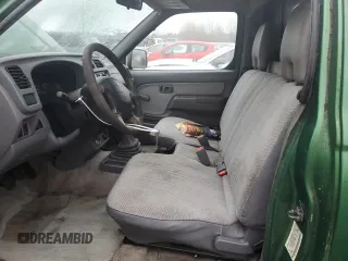 1998 Nissan Frontier XE with VIN 1N6DD21S4WC345165, listed as a Copart auction lot 87465104 with Not provided miles and Clean title. Bid and sale history available at DreamBid. Image 7.