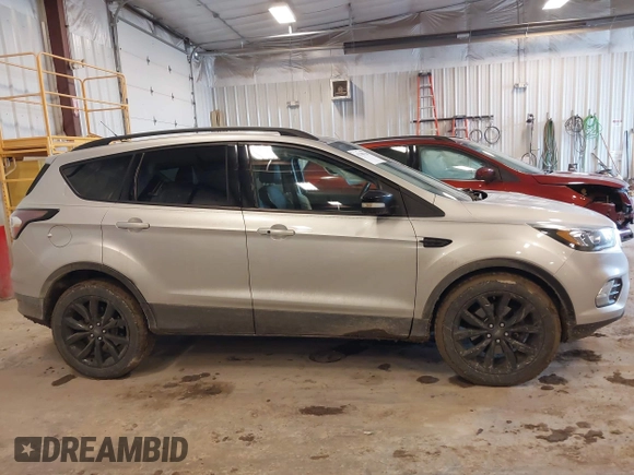 2017 Ford Escape Titanium with VIN 1FMCU9J94HUD92984, listed as a IAAI auction lot 41708720 with 176,550 mi miles. Bid and sale history available at carsss.com. Image 13.