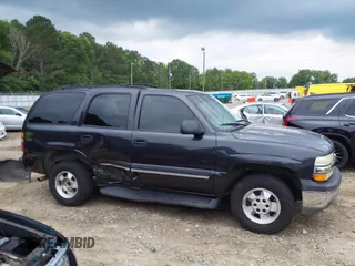 2004 Chevrolet Tahoe LS with VIN 1GNEC13V14J215470, listed as a IAAI auction lot 42432092 with Not provided miles and . Bid and sale history available at DreamBid. Image 13.
