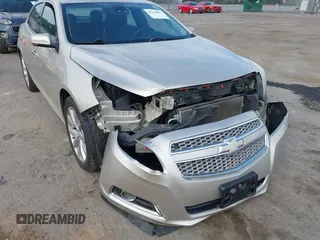 2013 Chevrolet Malibu LTZ with VIN 1G11H5SA5DF259174, listed as a IAAI auction lot 42145891 with 158,959 mi miles and . Bid and sale history available at DreamBid. Image 6.
