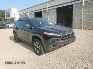 2014 Jeep Cherokee Trailhawk with VIN 1C4PJMBB8EW171116, listed as a Copart auction lot 60107215 with 168,979 mi miles and Salvage title. Bid and sale history available at DreamBid. Image 14.