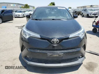 2018 Toyota C-HR XLE with VIN NMTKHMBXXJR044779, listed as a Copart auction lot 59895875 with 135,761 mi miles and Clean title. Bid and sale history available at DreamBid. Image 5.