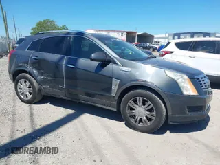 2013 Cadillac SRX Luxury Collection with VIN 3GYFNGE35DS610590, listed as a IAAI auction lot 41889588 with 172,769 mi miles. Bid and sale history available at carsss.com. Image 1.