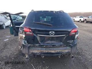 2014 Mazda CX-9 Grand Touring with VIN JM3TB3DV7E0429276, listed as a IAAI auction lot 41415446 with 94,939 mi miles and . Bid and sale history available at DreamBid. Image 6.