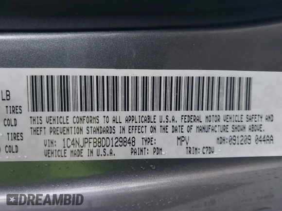 2013 Jeep Patriot Latitude with VIN 1C4NJPFB8DD129848, listed as a IAAI auction lot 40949386 with 168,839 mi miles and . Bid and sale history available at carsss.com. Image 9.