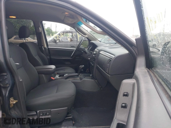2003 Jeep Grand Cherokee Laredo with VIN 1J4GW48NX3C532874, listed as a IAAI auction lot 42613091 with 165,920 mi miles and . Bid and sale history available at DreamBid. Image 5.