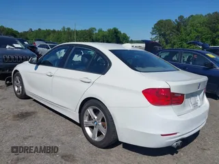 2014 BMW 3 Series 328i with VIN WBA3A5C58EF605108, listed as a IAAI auction lot 42129770 with 169,924 mi miles and . Bid and sale history available at DreamBid. Image 3.