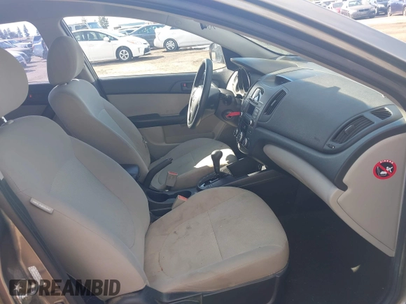 2010 Kia Forte EX with VIN KNAFU4A28A5229372, listed as a IAAI auction lot 41911118 with 166,084 mi miles. Bid and sale history available at carsss.com. Image 5.