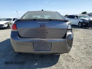 2009 Ford Focus SE z VIN 1FAHP35N59W148326, wystawiony jako Copart lot #57688025 z przebiegiem Nie podano mil oraz Szkoda całkowita • Salvage title. Historia ofert i sprzedaży dostępna na DreamBid. Obrazek 6.