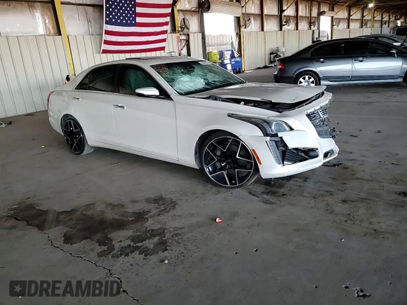 2014 Cadillac CTS Luxury RWD z VIN 1G6AR5S33E0185430, wystawiony jako Copart lot #53998555 z przebiegiem 153 283 mil mil oraz Szkoda całkowita • Salvage title. Historia ofert i sprzedaży dostępna na DreamBid. Obrazek 13.