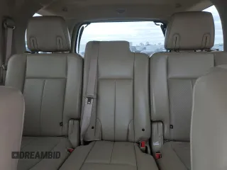 2011 Ford Expedition XLT with VIN 1FMJU1H52BEF47545, listed as a Copart auction lot 52987825 with 127,500 mi miles and Salvage title. Bid and sale history available at DreamBid. Image 10.