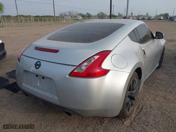 2013 Nissan 370Z with VIN JN1AZ4EH6DM881661, listed as a IAAI auction lot 41793240 with NaN miles. Bid and sale history available at carsss.com. Image 4.