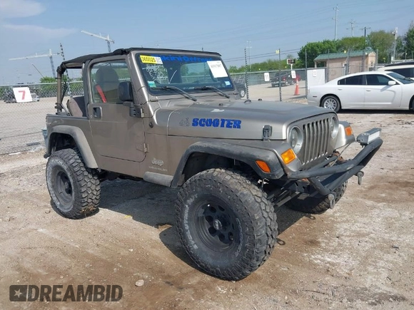 2005 Jeep Wrangler SE with VIN 1J4FA29S25P328827, listed as a IAAI auction lot 41917807 with 157,562 mi miles. Bid and sale history available at carsss.com. Image 1.