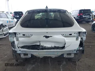 2021 Ford Mustang Mach-E Premium с VIN 3FMTK3SU6MMA27937, выставлен на аукционе IAAI как лот 42033076 с пробегом 90 743 миль миль и . История ставок и продаж доступна на DreamBid. Изображение 6.