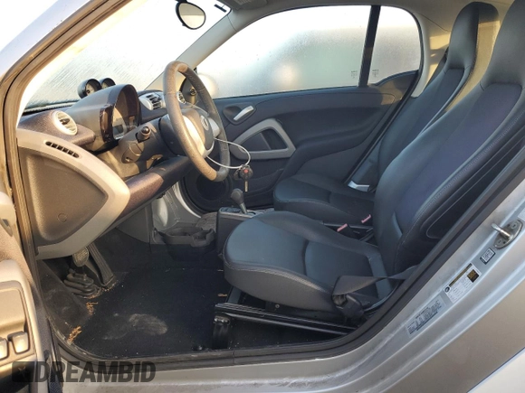 2015 Smart fortwo Passion z VIN WMEEJ9AA5FK839381, wystawiony jako Copart lot #43635495 z przebiegiem Nie podano mil oraz Tytuł czysty. Historia ofert i sprzedaży dostępna na DreamBid. Obrazek 7.