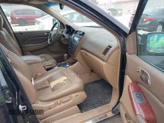 2004 Acura MDX Touring Pkg with VIN 2HNYD18694H551917, listed as a IAAI auction lot 42130100 with 207,699 mi miles. Bid and sale history available at carsss.com. Image 5.