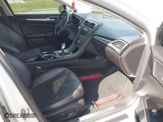 2014 Ford Fusion Energi Titanium with VIN 3FA6P0SU0ER149155, listed as a IAAI auction lot 41519306 with 148,406 mi miles. Bid and sale history available at carsss.com. Image 5.