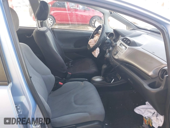 2009 Honda Fit with VIN JHMGE88289S014801, listed as a IAAI auction lot 38499131 with 140,660 mi miles and . Bid and sale history available at DreamBid. Image 5.