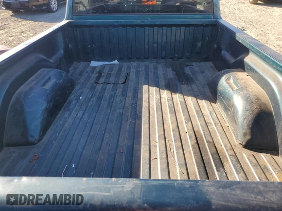 1998 Dodge Dakota SLT z VIN 1B7FL26XXWS656706, wystawiony jako Copart lot #75295904 z przebiegiem 89 796 mil mil oraz Szkoda całkowita • Salvage title. Historia ofert i sprzedaży dostępna na DreamBid. Obrazek 10.