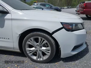 2014 Chevrolet Impala LT with VIN 2G1125S32E9267584, listed as a IAAI auction lot 42079857 with 144,812 mi miles and . Bid and sale history available at DreamBid. Image 18.