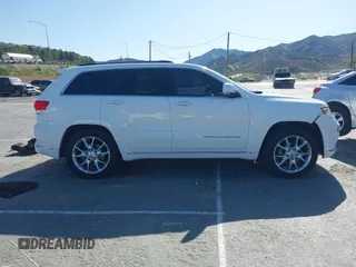 2016 Jeep Grand Cherokee with VIN 1C4RJEJM8GC321506, listed as a IAAI auction lot 41969587 with 226,072 mi miles and . Bid and sale history available at DreamBid. Image 14.