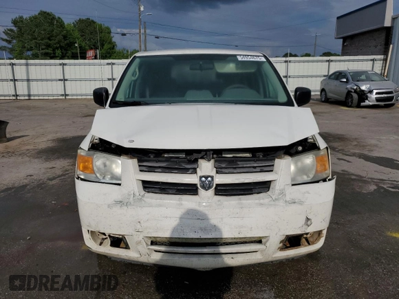 2009 Dodge Grand Caravan SE z VIN 2D8HN44E29R631418, wystawiony jako Copart lot #54954675 z przebiegiem 271 986 mil mil oraz Szkoda całkowita • Salvage title. Historia ofert i sprzedaży dostępna na DreamBid. Obrazek 5.