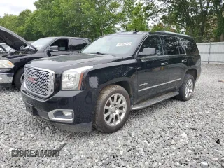 2015 GMC Yukon Denali z VIN 1GKS2CKJ5FR597200, wystawiony jako Copart lot #61503115 z przebiegiem 193 006 mil mil oraz Czysty tytuł • Clean title. Historia ofert i sprzedaży dostępna na DreamBid. Obrazek 1.