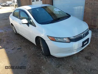 2012 Honda Civic LX z VIN 2HGFB2F58CH334085, wystawiony jako IAAI lot #41629424 z przebiegiem 146 644 mil mil oraz . Historia ofert i sprzedaży dostępna na DreamBid. Obrazek 1.