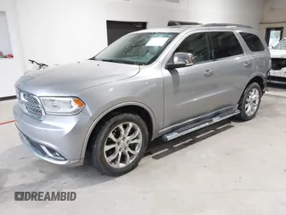 2016 Dodge Durango Citadel Anodized Platinum with VIN 1C4SDJET9GC459090, listed as a IAAI auction lot 41991478 with 115,924 mi miles and . Bid and sale history available at DreamBid. Image 2.