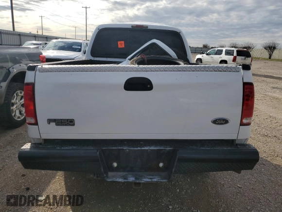 2003 Ford F-250 XL with VIN 3FTNX20LX3MB38136, listed as a Copart auction lot 82703304 with Not provided miles and Salvage title. Bid and sale history available at DreamBid. Image 6.