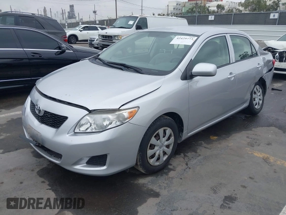2010 Toyota Corolla with VIN JTDBU4EE5AJ067942, listed as a IAAI auction lot 42429773 with 19,539 mi miles and . Bid and sale history available at DreamBid. Image 2.