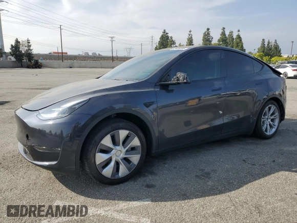2024 Tesla Model Y Long Range with VIN 7SAYGDEE2RA244242, listed as a Copart auction lot 52635095 with 4,994 mi miles and Salvage title. Bid and sale history available at DreamBid. Image 1.