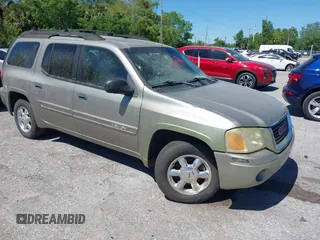 2003 GMC Envoy XL SLE with VIN 1GKES16S836157084, listed as a IAAI auction lot 41796762 with 222,161 mi miles. Bid and sale history available at carsss.com. Image 1.