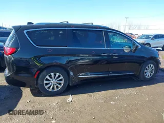 2018 Chrysler Pacifica Touring L with VIN 2C4RC1BGXJR157184, listed as a IAAI auction lot 41803388 with 102,095 mi miles and . Bid and sale history available at DreamBid. Image 13.