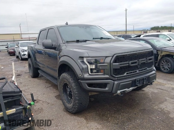 2020 Ford F-150 Raptor with VIN 1FTFW1RG0LFB66566, listed as a IAAI auction lot 41306076 with 92,596 mi miles and . Bid and sale history available at carsss.com. Image 1.