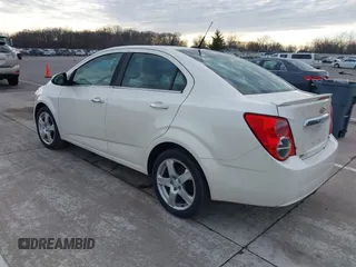 2014 Chevrolet Sonic LTZ with VIN 1G1JE5SH3E4133088, listed as a IAAI auction lot 41072056 with 143,855 mi miles. Bid and sale history available at carsss.com. Image 3.